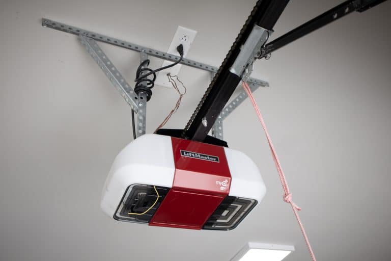 Image shows LiftMaster Garage Door Opener installed on ceiling.
